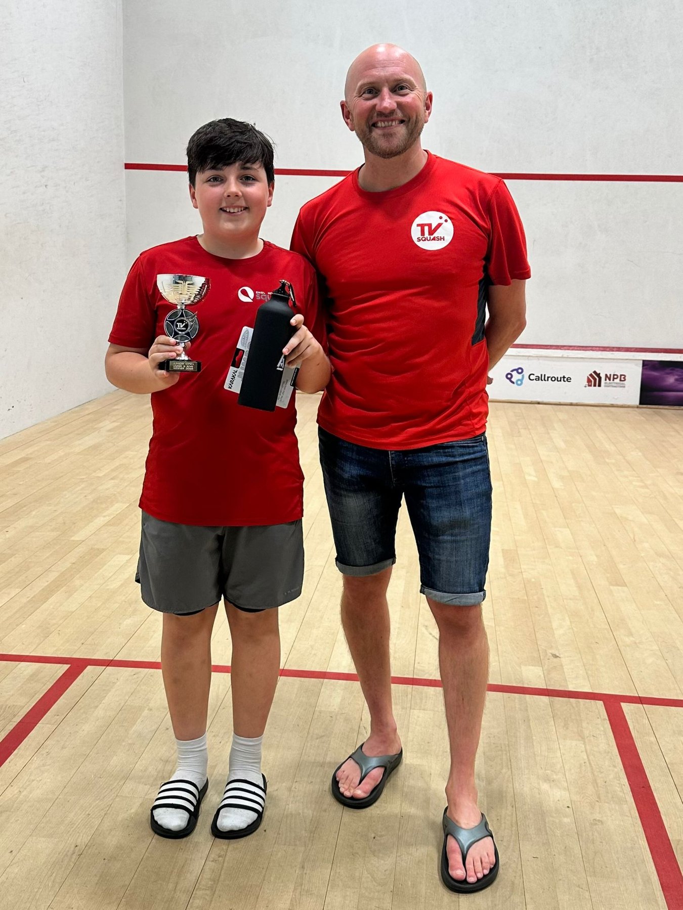 Tim Veil presenting a trophy